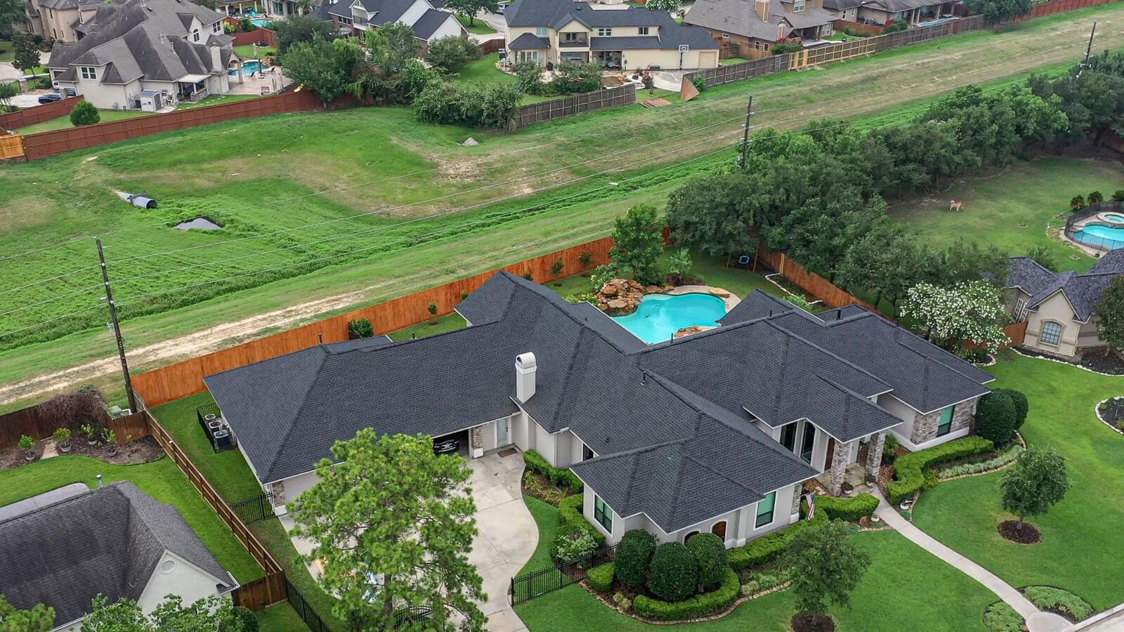Aerial drone view of completed architectural shingle roof
